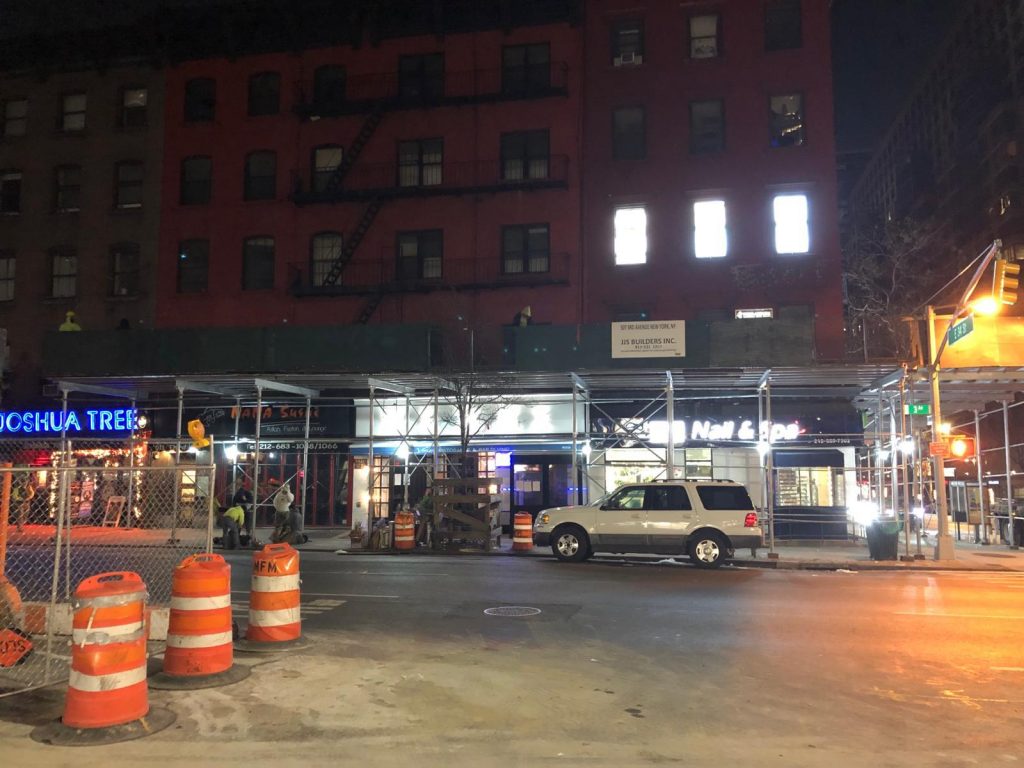 sidewalk shed in queens